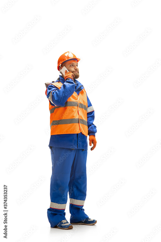Handsome contractor, builder isolated over white studio background. Concept of professional occupation, work, job, building, investment. Copyspace for ad, text. Caucasian man wearing equipment. Handsome contractor, builder isolated over white studio background. Concept of professional occupation, work, job, building, investment. Copyspace for ad, text. Caucasian man wearing equipment.
