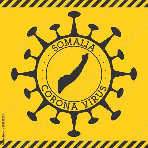 Corona virus in Somalia sign. Round badge with shape of virus and Somalia map. Yellow country epidemic lockdown stamp. Vector illustration.
