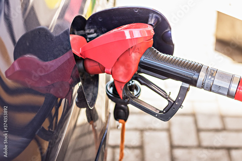 Refueling with gasoline using a gasoline pump car at a gas station