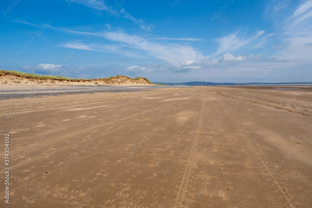 Haverigg beach is found at the mouth of the Duddon Estuary and has views over the Lake District fells. The shingle beach gives way to a vast expanse of sand