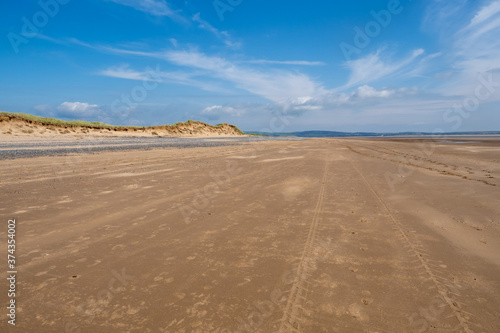 Haverigg beach is found at the mouth of the Duddon Estuary and has views over the Lake District fells. The shingle beach gives way to a vast expanse of sand