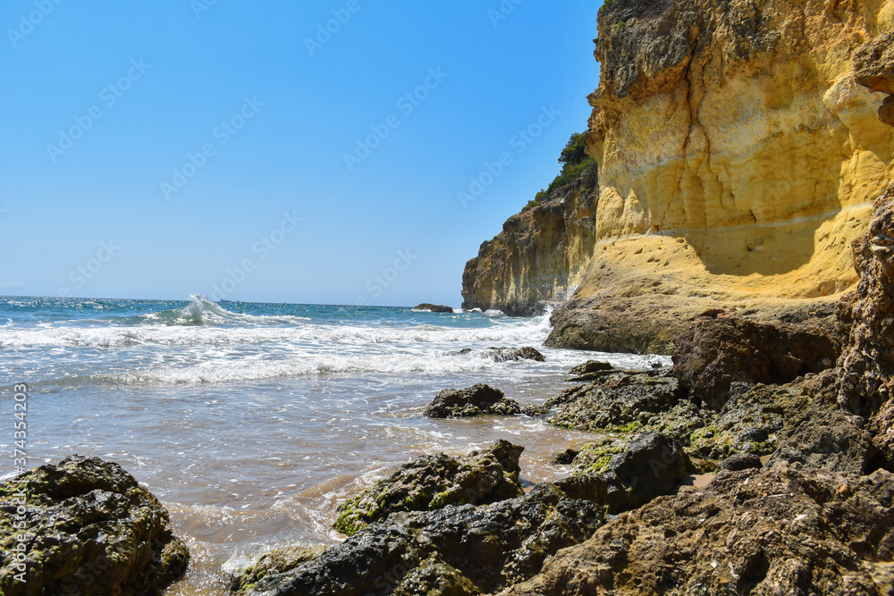 Rocks and waves in the Mediterranean Sea, Cala fonda, Tarragona.