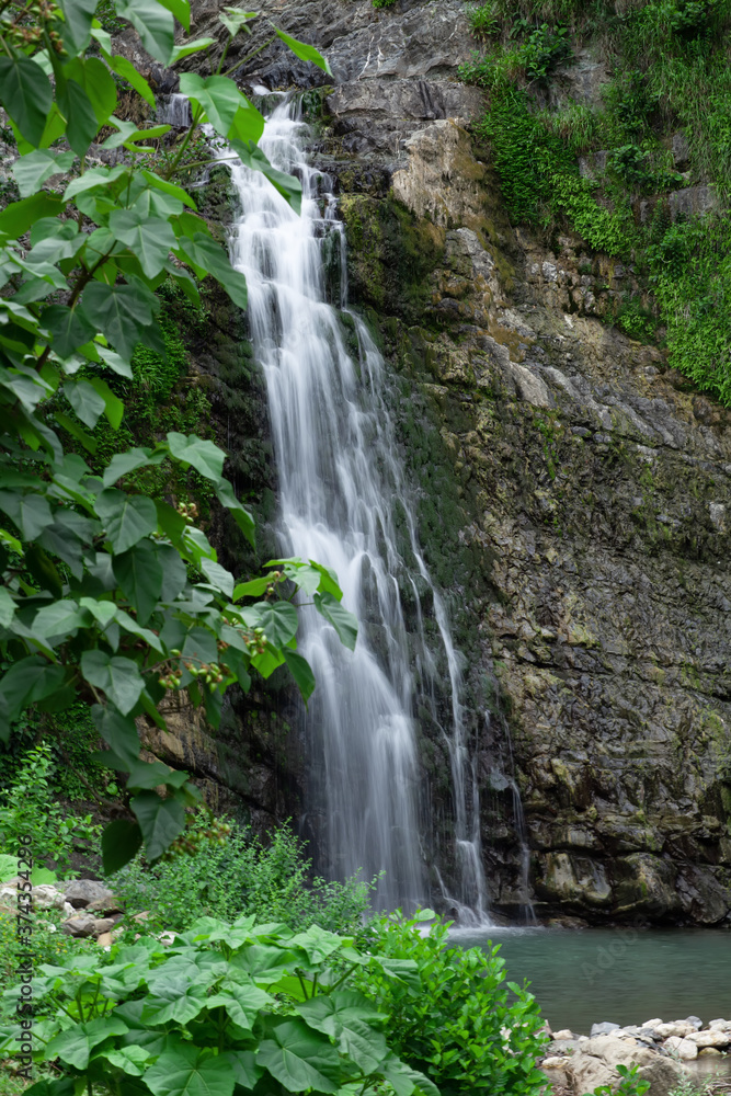 High mountain with a waterfall.Mountain landscape in summer