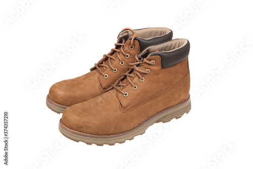 Men's brown leather boots. Stylish winter shoes , isolated on white