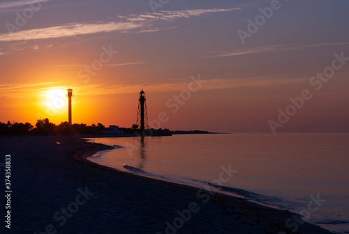 Lighthouse on Dzharylgach island  Kherson region in Ukraine. Beautiful sea sunrise 