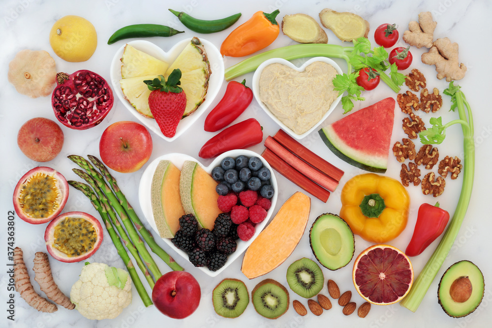 Vegan health food for a healthy heart with super foods to support the cardiovascular system with low GI for diabetics. High in antioxidants, fibre, protein, omega 3 & anthocyanins. Flat lay. Vegan health food for a healthy heart with super foods to support the cardiovascular system with low GI for diabetics. High in antioxidants, fibre, protein, omega 3 & anthocyanins. Flat lay.