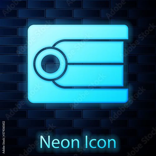 Glowing neon Dentures model icon isolated on brick wall background. Dental concept. Vector.