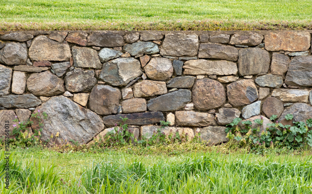 Tightly Constructed Beautiful Old Stone Wall in a Field at Stroud Preserve, Chester County, Pennsylvania, USA