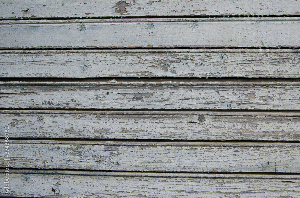 Background of old boards with blue-gray peeling paint Background of old boards with blue-gray peeling paint