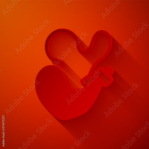 Paper cut Spanish wineskin icon isolated on red background. Paper art style. Vector.