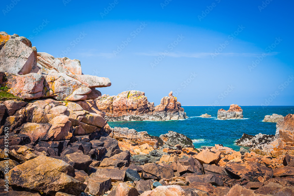 Colourful rocks at the lle de Brehat off the coast of Brittany, France Colourful rocks at the lle de Brehat off the coast of Brittany, France