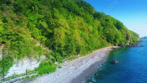 Gravel beach on the island photo