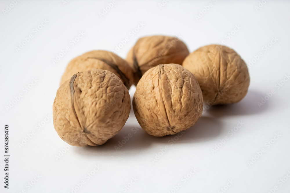 Walnuts on a white background close up Walnuts on a white background close up
