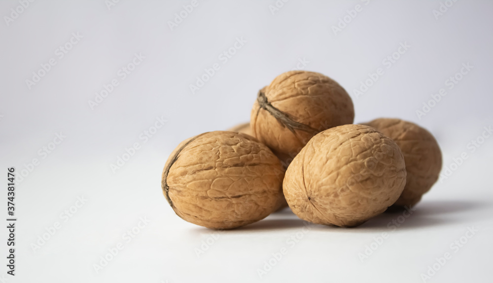 Walnuts on a white background close up Walnuts on a white background close up