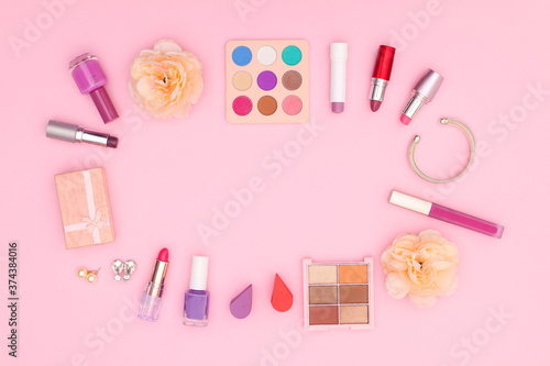 Pastel make up products on pink theme 