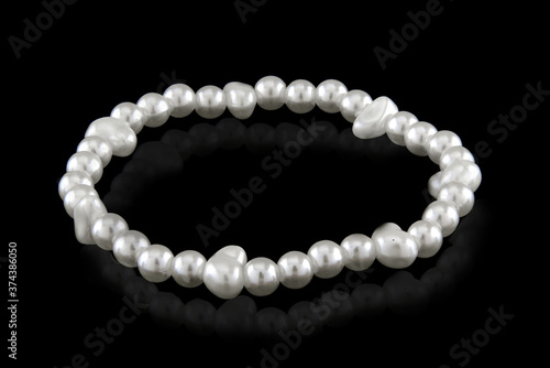Jewelry bracelet from white pearls of small size