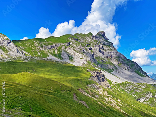 Alpine peaks Chli Haupt Murmelchopf and Haupt or Brünighaupt (Bruenighaupt oder Brunighaupt) in the Uri Alps mountain massif, Melchtal - Canton of Obwald, Switzerland (Kanton Obwalden, Schweiz) photo