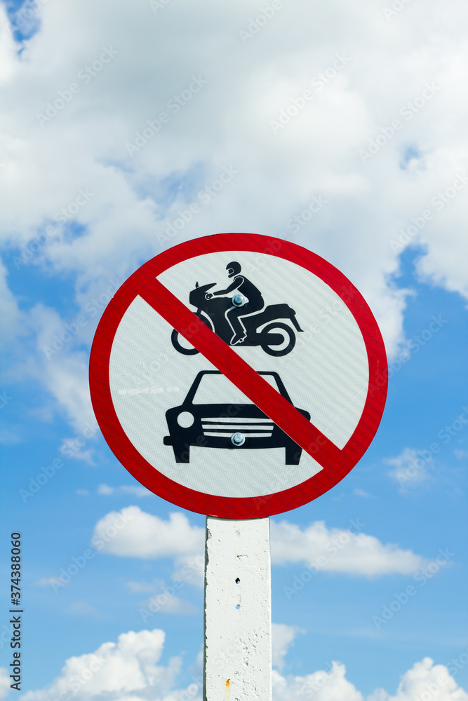 no car and motor bicycle entry sign with blue sky and cloud
