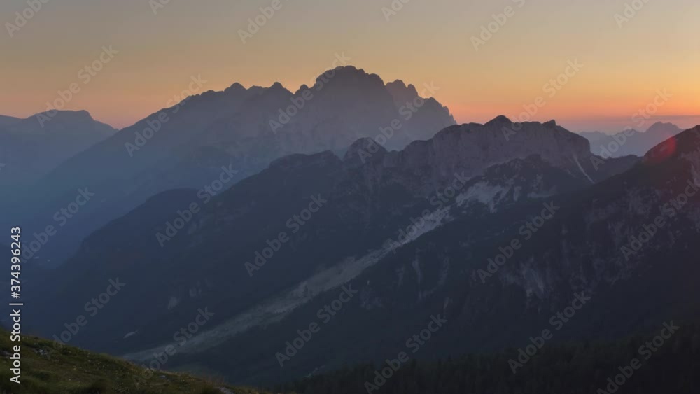 Beautiful sunset over Alps. View from Mangart saddle. Landscapes of Slovenia. Beautiful sunset over Alps. View from Mangart saddle. Landscapes of Slovenia.