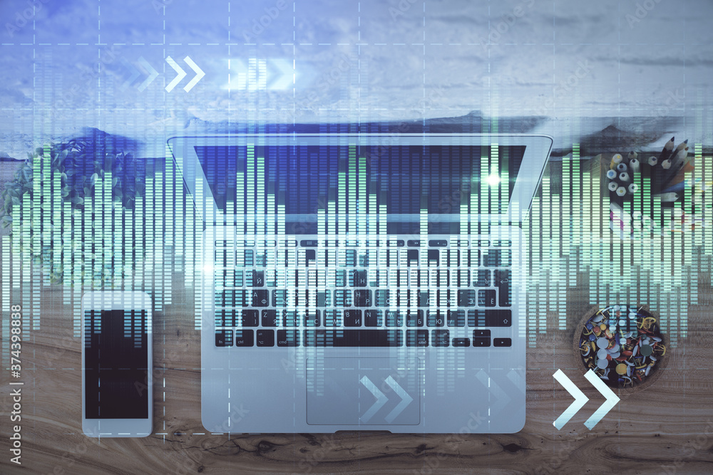 Multi exposure of financial chart drawing over table background with computer. Concept of research and analysis. Top view.