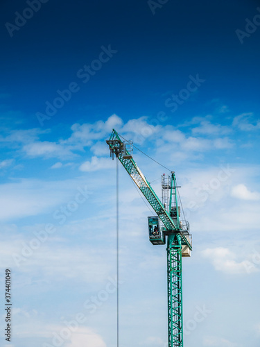 Crane against a blue sky.