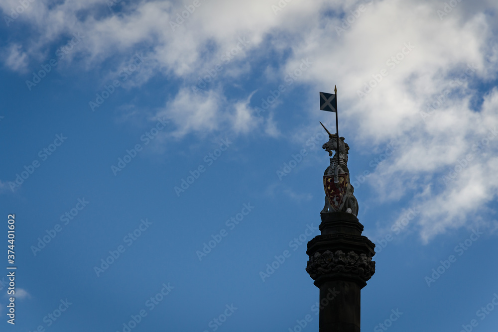 A statue of a unicorn with the Scottish flag in Edinburgh's Old Town, Scotland A statue of a unicorn with the Scottish flag in Edinburgh's Old Town, Scotland