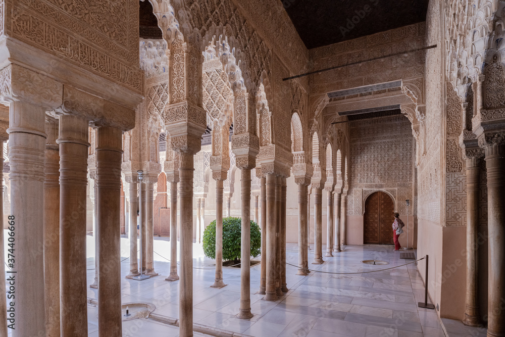 Interior and exterior of the historical building Alhambra, in Granada, Spain in a sunny day in 2020.