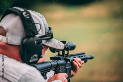 hunter aiming rifle