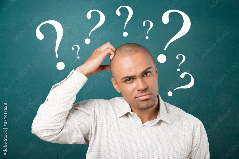 Question sign with a beautiful alarmed man on background Question sign with a beautiful alarmed man on background