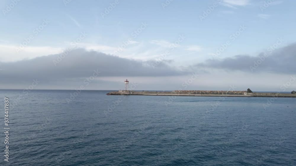 View of the lighthouse and the harbour View of the lighthouse and the harbour