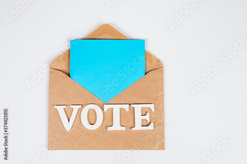 VOTE logo on open envelope....