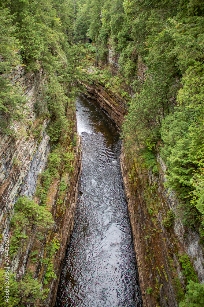 River going through a rocky canyon River going through a rocky canyon