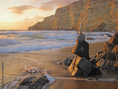 red beach sunset, matala, crete greece