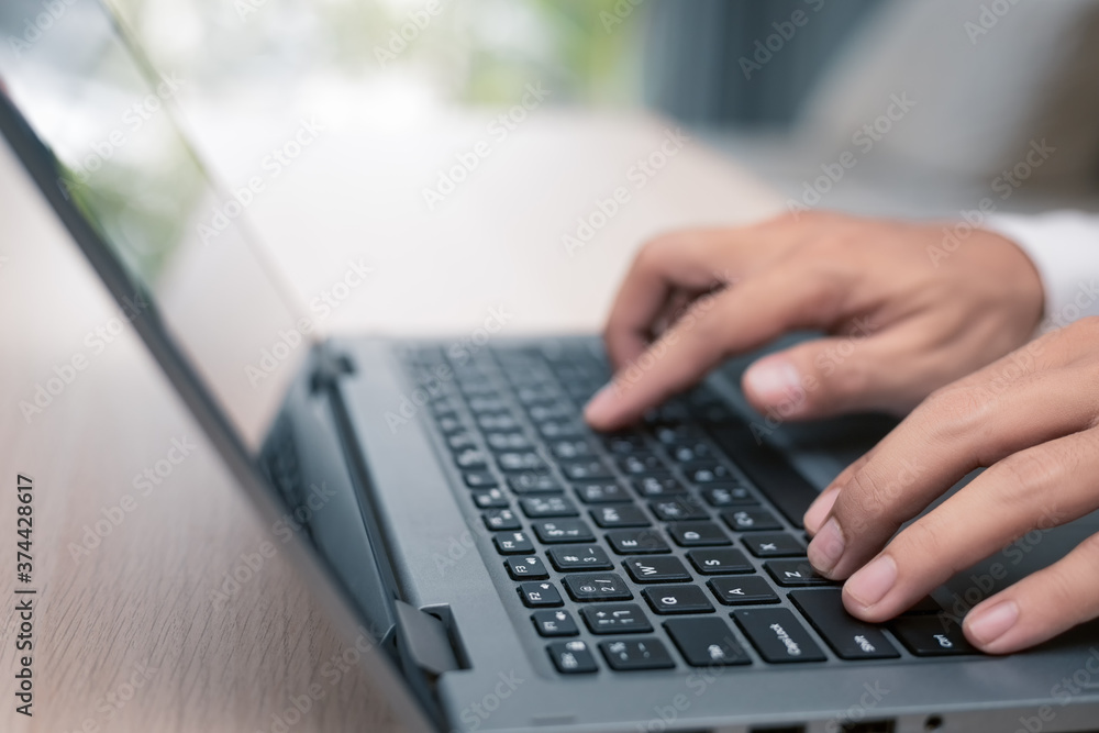 Man person hands using Laptop for business concept. Man person hands using Laptop for business concept.
