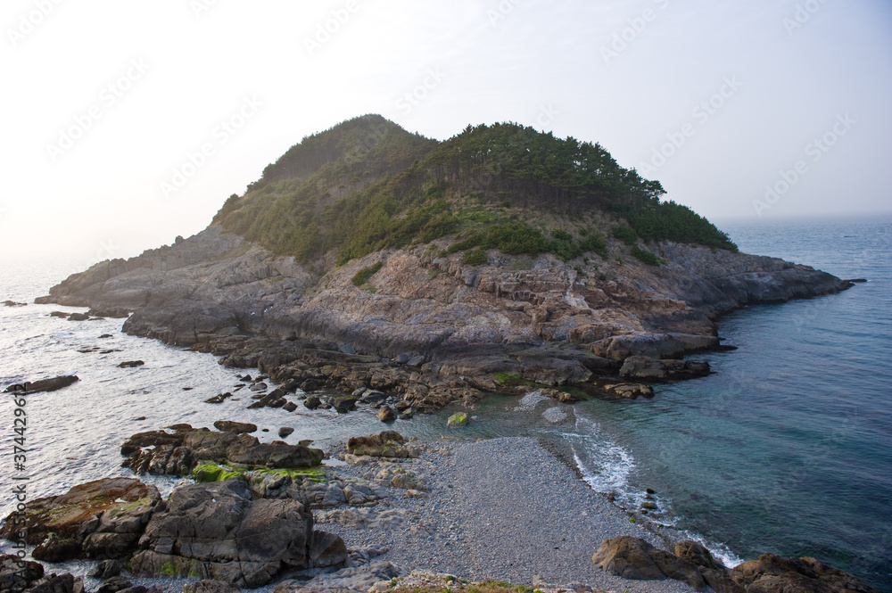 The beautiful landscape of sea side and rock beach.