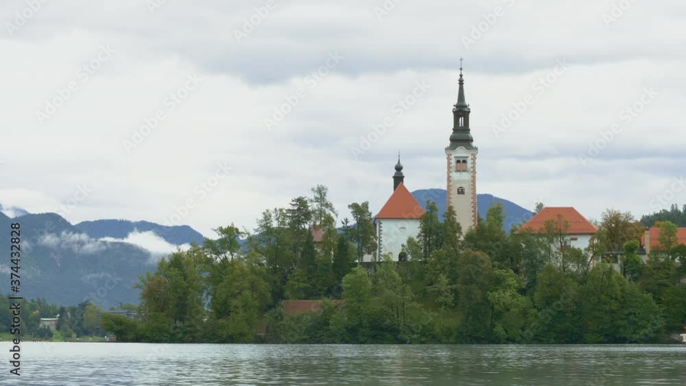 Beautiful timelapse of Bled island landscape with Pilgrimage Church of the Assumption of Maria on Bled lake, Bled, Slovenia Beautiful timelapse of Bled island landscape with Pilgrimage Church of the Assumption of Maria on Bled lake, Bled, Slovenia