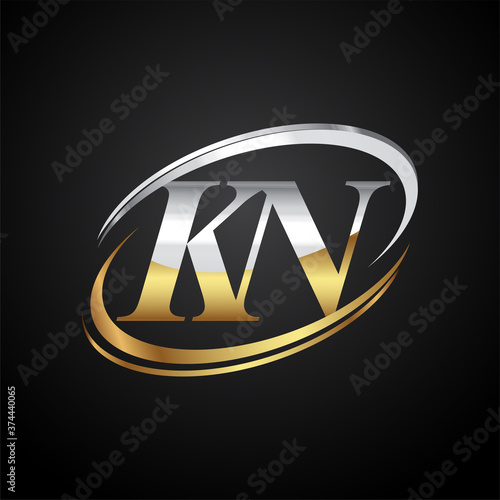 initial letter KN logotype company name colored gold and silver swoosh design. isolated on black background.