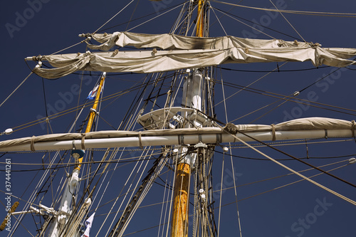 Sailboat's mast, canvas sails andrope  lines