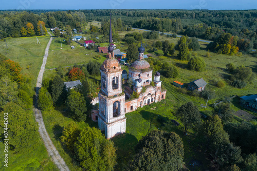 Ancient abandoned Assumption Church in September landscape (aerial photography). The village of Parkhachevo. Ivanovo region, Russia