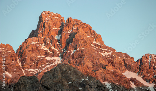 The West Face Summit of Grand Teton Mountain at Sunset.
