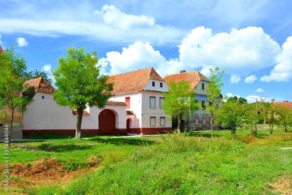 Typical rural landscape and peasant houses in Beia, Transylvania, Romania. The settlement was founded by the Saxon colonists in the middle of the 12th century Typical rural landscape and peasant houses in Beia, Transylvania, Romania. The settlement was founded by the Saxon colonists in the middle of the 12th century