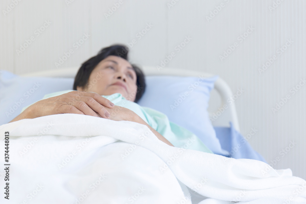 Asian concept elderly woman lying in bed and recuperate in the hospital. Asian concept elderly woman lying in bed and recuperate in the hospital.
