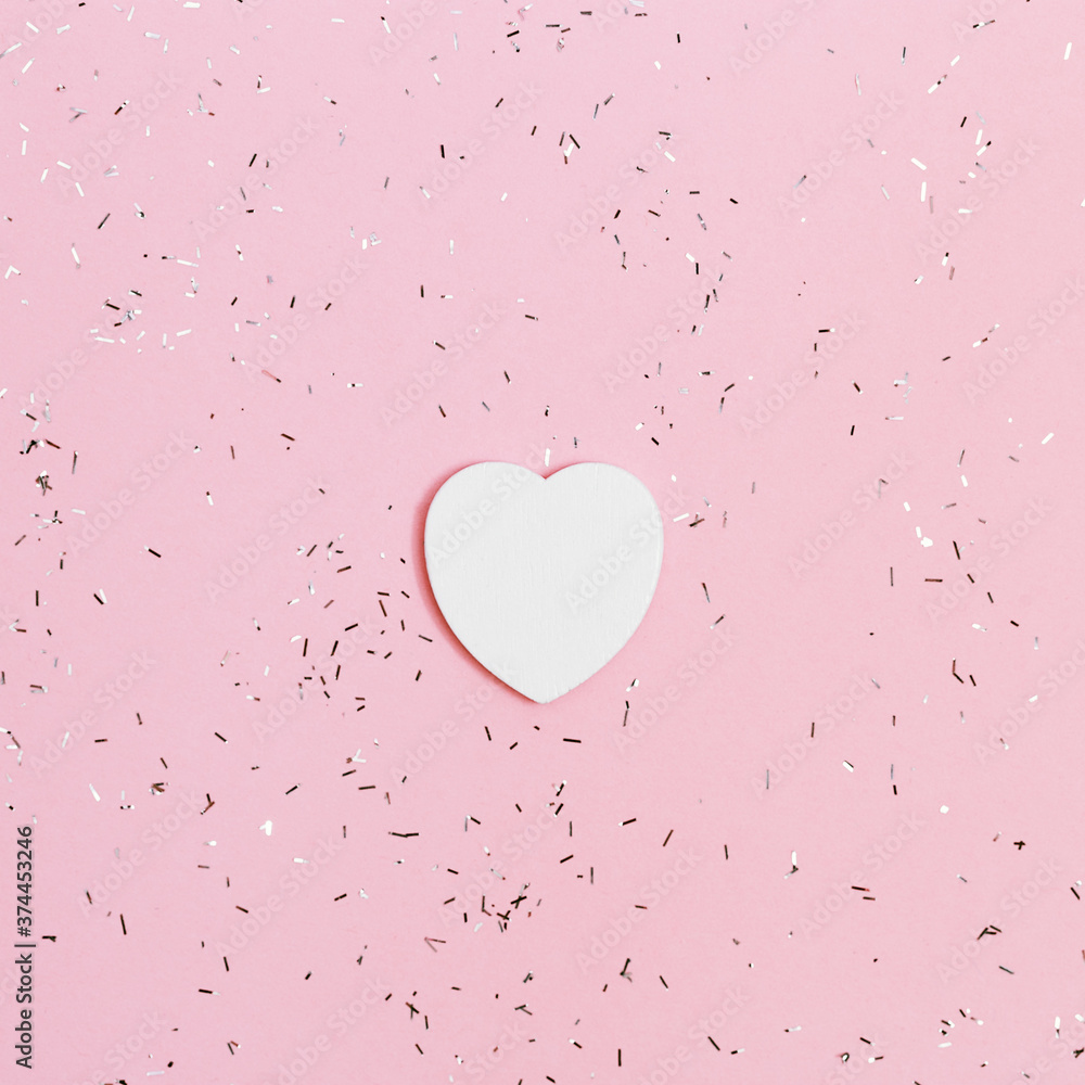 Holiday background with small white heart. Concept for Valentines day, Birthday. Top view. Minimal style.
