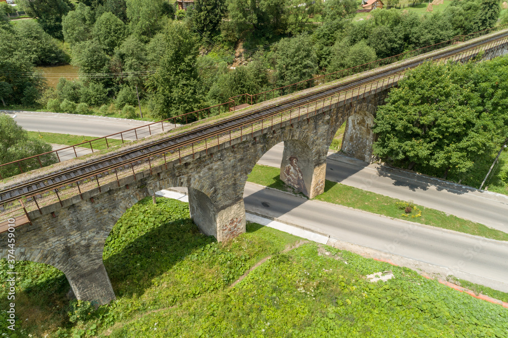 Aerial view of railway viaduct in Vorokhta village, Carpathians mountains, Ukraine
