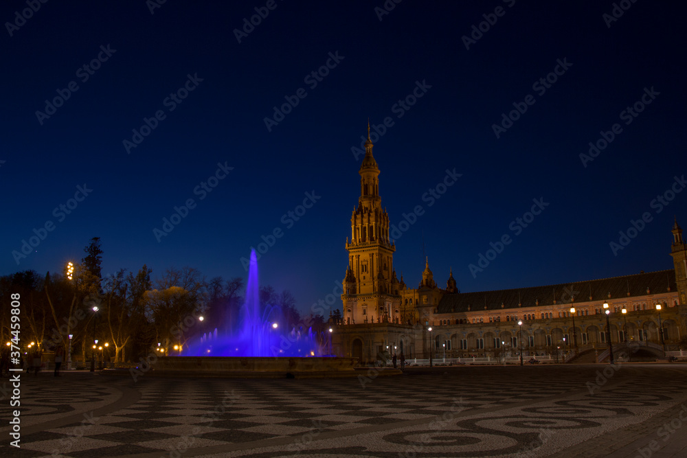 Colorful Fountain at Night in Plaza España, Seville Spain