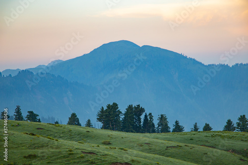 lush green landscape mountains - siri paye Medows cloudy sky in early morning meadow in the mountains