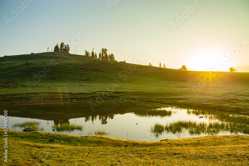 sunrise over the lake and water reflection - Siri paye Medows