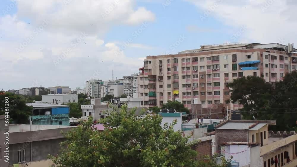 residential buildings and houses in city, Indian street sky background with old house and nature in Indore, India-july 2020 residential buildings and houses in city, Indian street sky background with old house and nature in Indore, India-july 2020