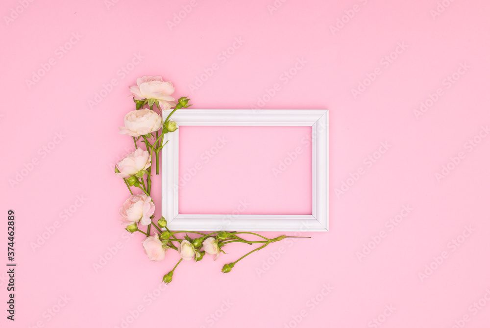 Decorative wooden photo frame on pink background 