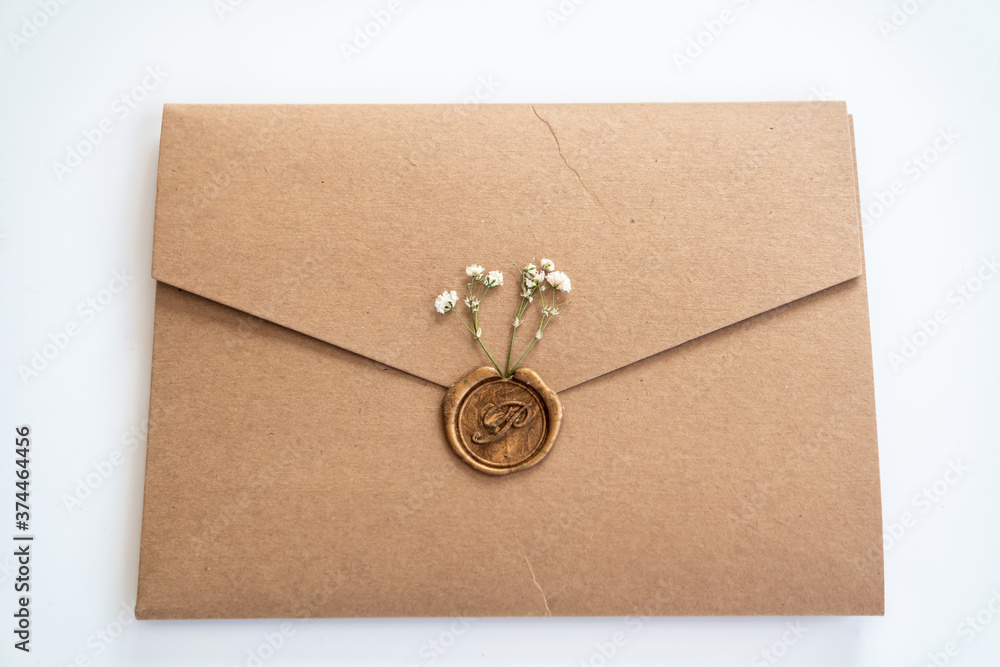 Envelope with wax seal and little dry flowers Envelope with wax seal and little dry flowers